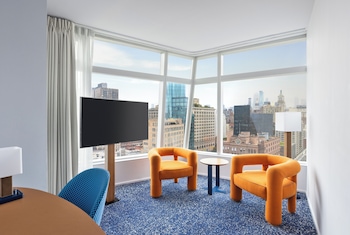 Studio Suite | Living area | 60-inch LED TV with satellite channels, TV at The Standard East Village