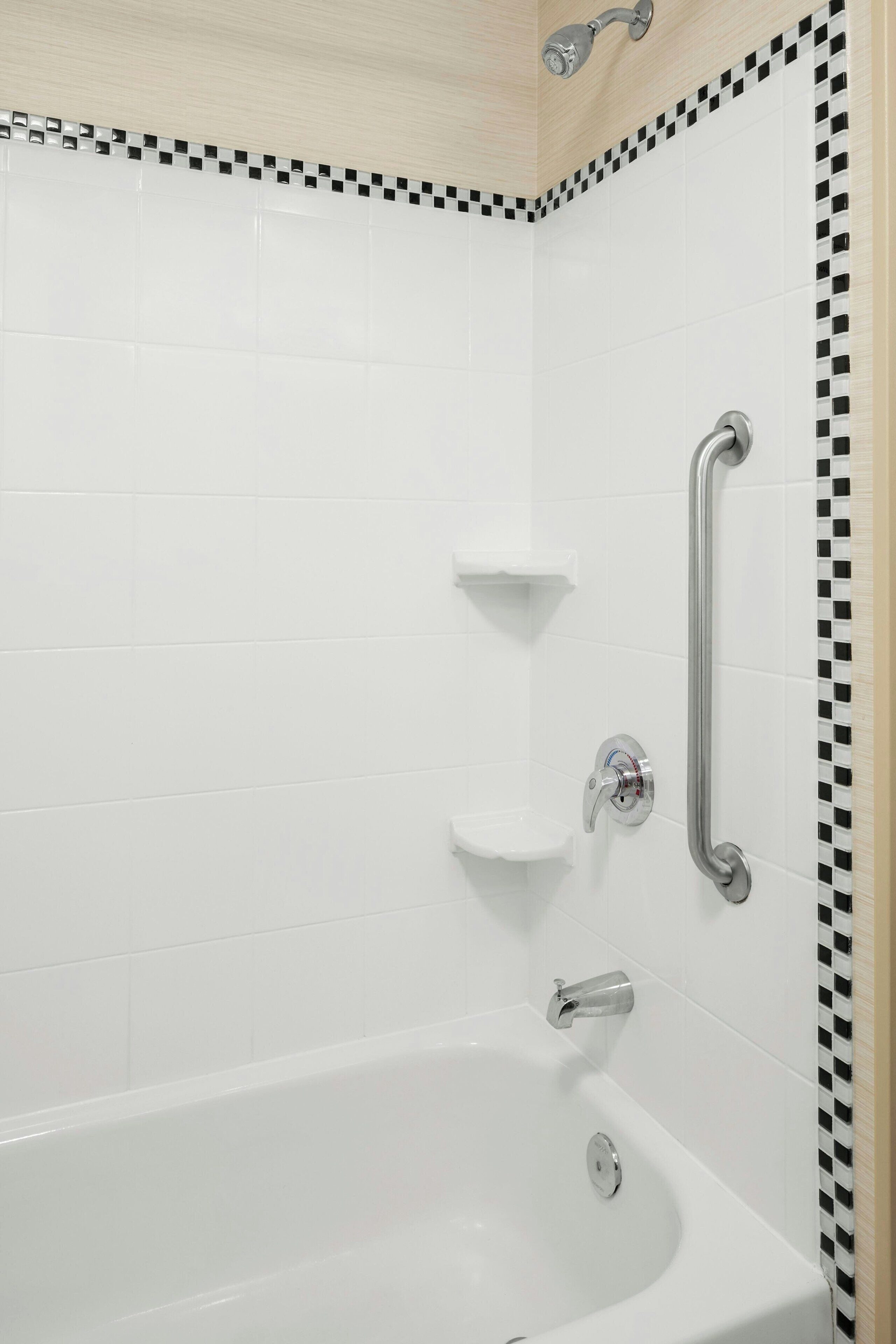 combined shower/bathtub, hair dryer, towels, soap