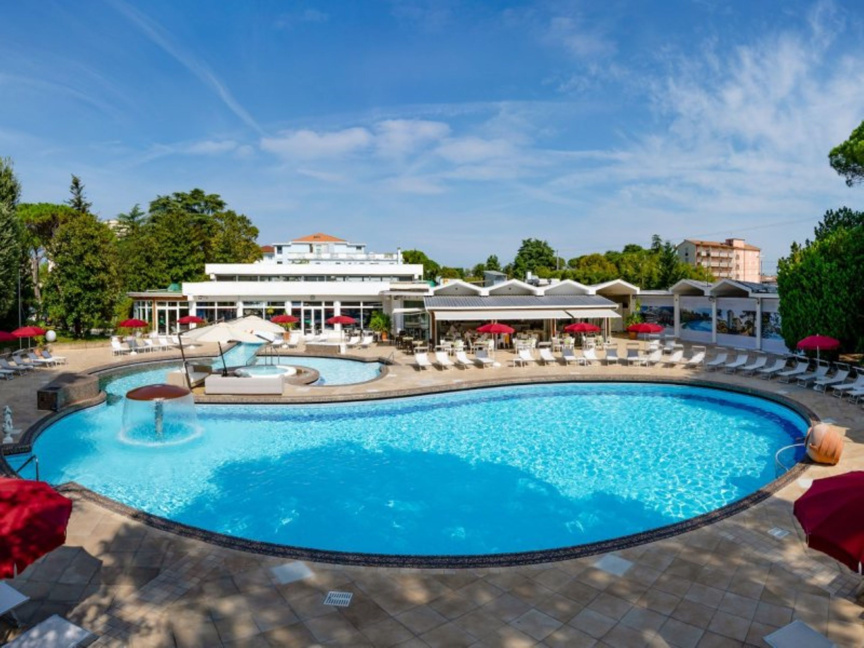 Indoor pool, outdoor pool, pool umbrellas, pool loungers