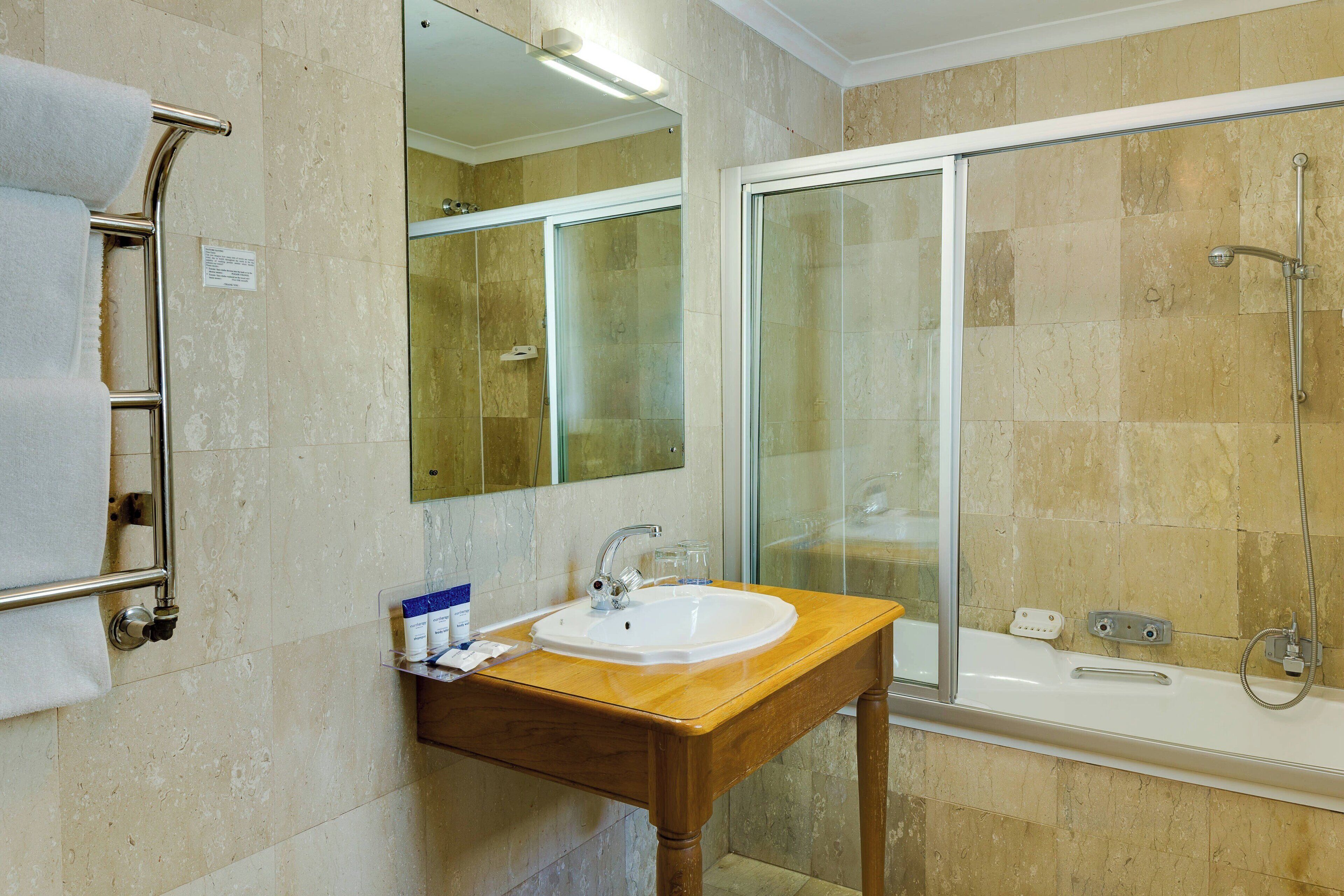 suite, 1 double bed, garden view | bathroom | free toiletries, hair dryer, bidet, towels