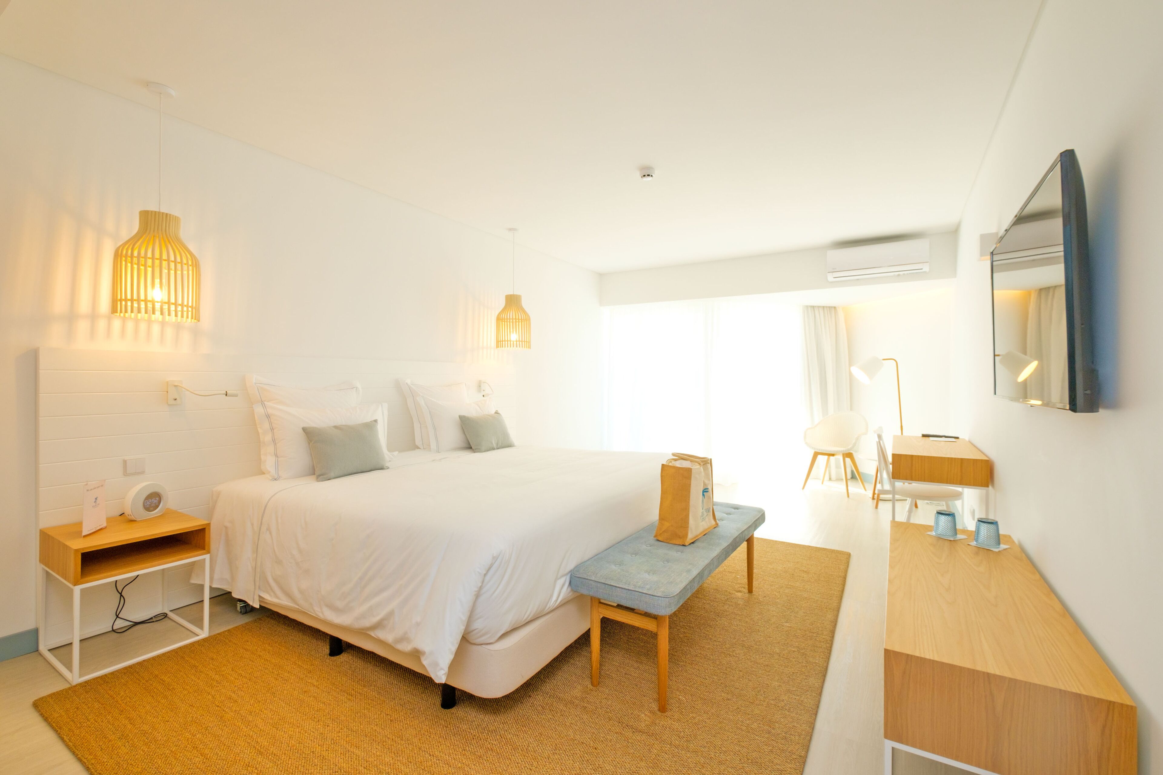 egyptian cotton sheets, premium bedding, pillow-top beds, minibar