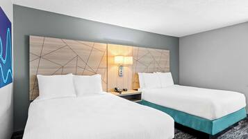 Desk, laptop workspace, blackout drapes, iron/ironing board