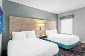 Desk, laptop workspace, blackout drapes, iron/ironing board