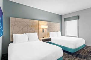 Desk, laptop workspace, blackout drapes, iron/ironing board