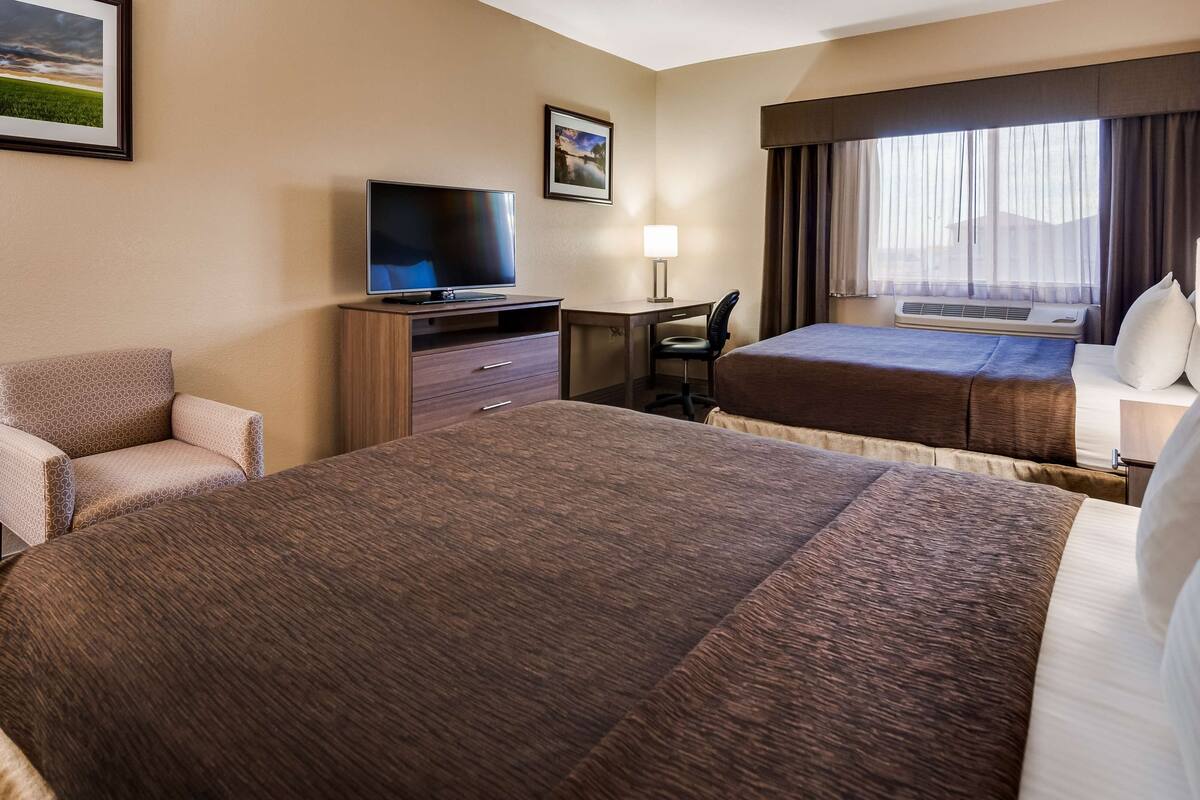 standard room, 2 queen beds, non smoking, refrigerator & microwave | desk, laptop workspace, iron/ironing board, wifi