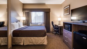 Suite, 1 King Bed, Non Smoking, Refrigerator & Microwave (with Sofabed) | Desk, laptop workspace, iron/ironing board, WiFi