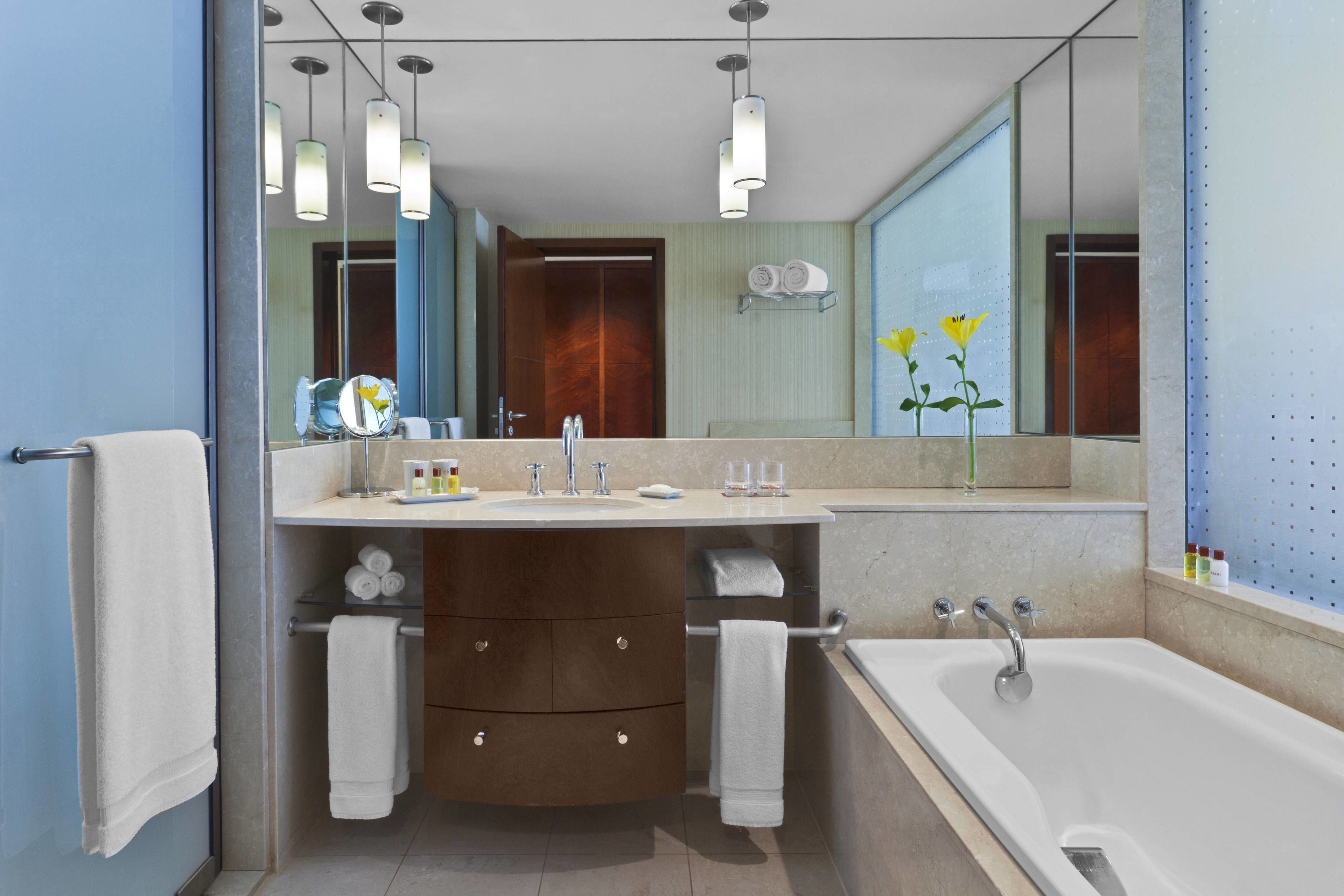 combined shower/bathtub, deep-soaking bathtub, rainfall showerhead