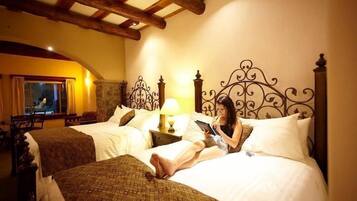 Premium bedding, down duvets, memory-foam beds, desk