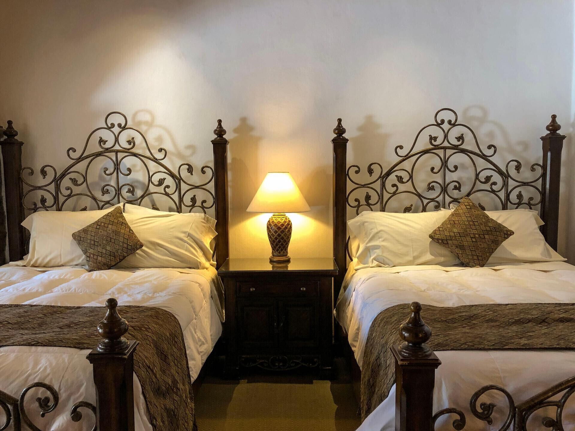 premium bedding, down duvets, memory-foam beds, desk