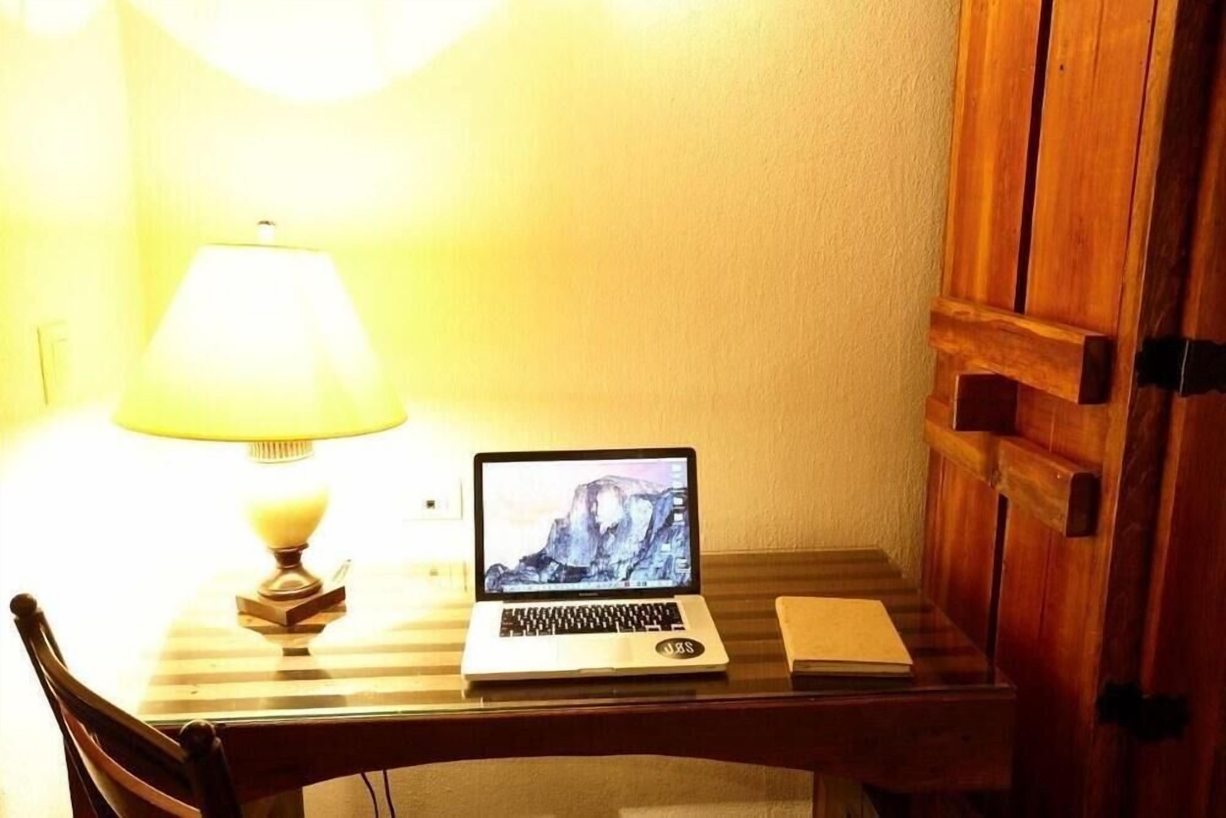 premium bedding, down duvets, memory-foam beds, desk