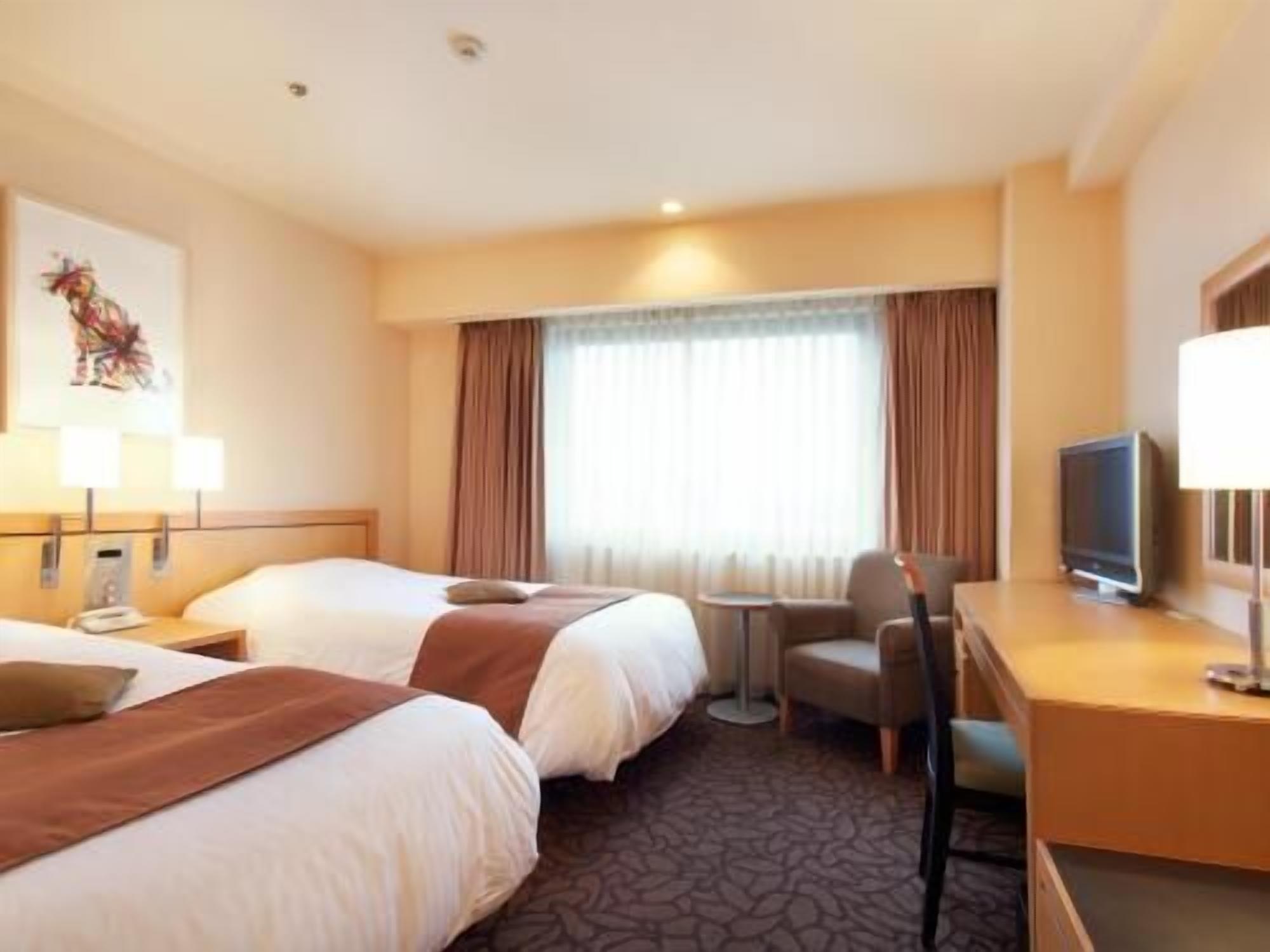 Premium bedding, pillow-top beds, in-room safe, desk