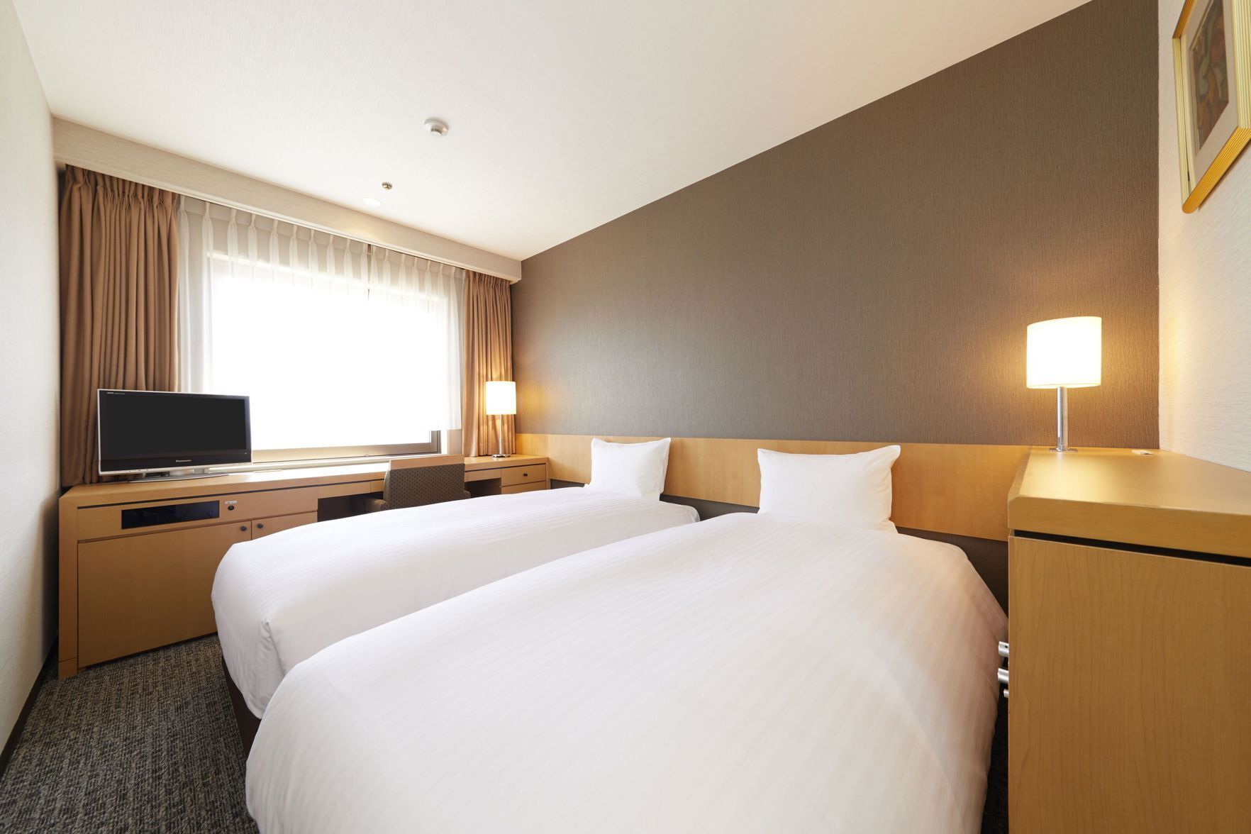 Premium bedding, pillow-top beds, in-room safe, desk