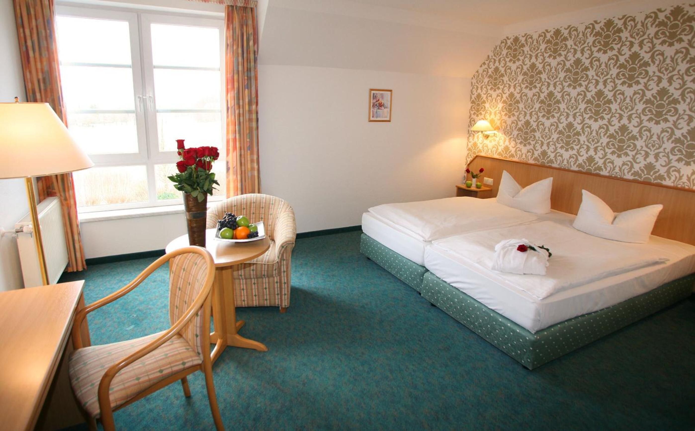 desk, blackout curtains, free wifi, bed sheets