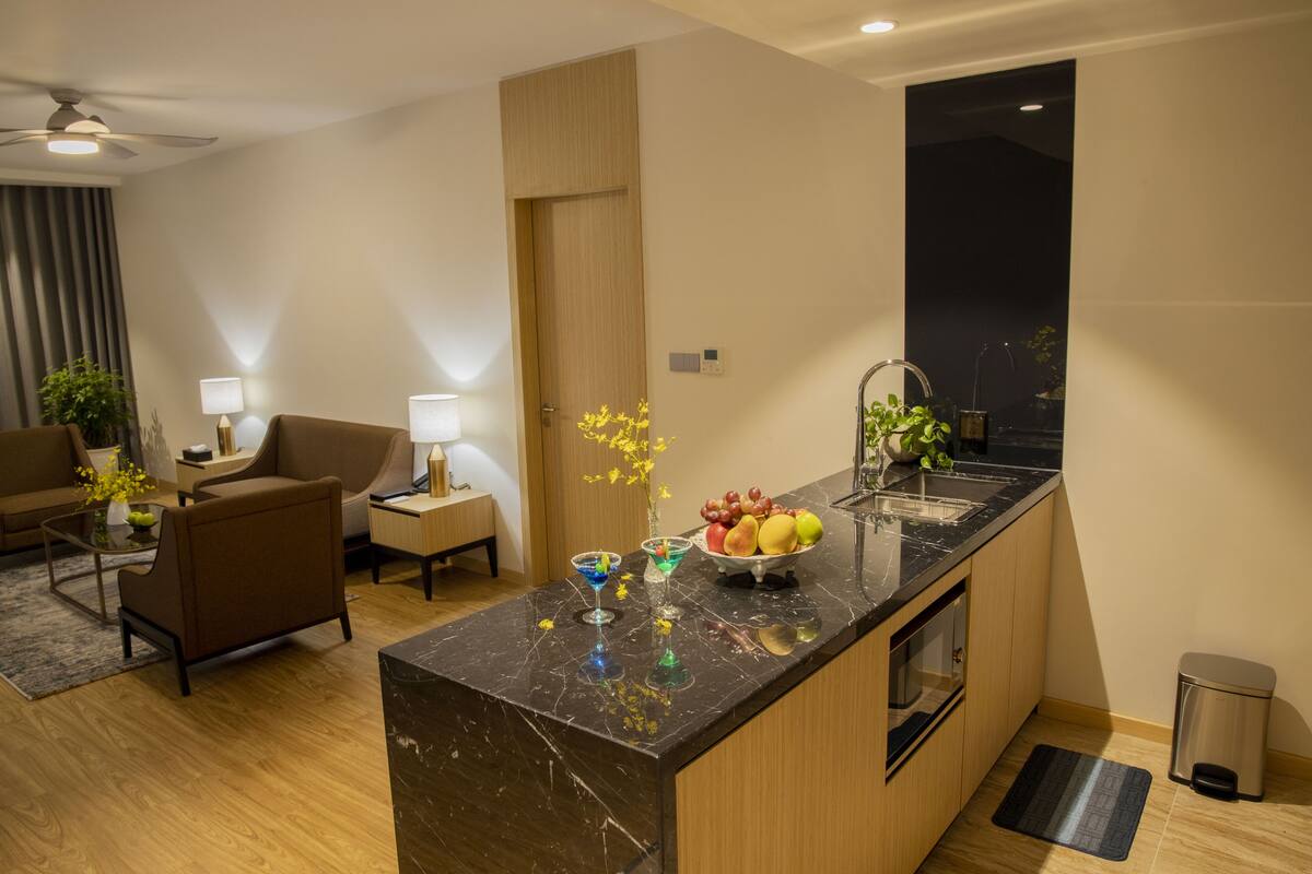 deluxe two-bedroom apartment | private kitchen | fridge, electric kettle, paper towels