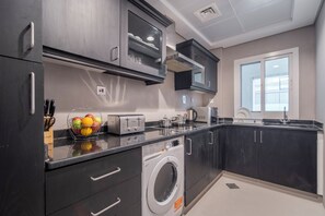 Studio | Cuisine privée | Réfrigérateur, micro-ondes, plaque de cuisson, cafetière/bouilloire