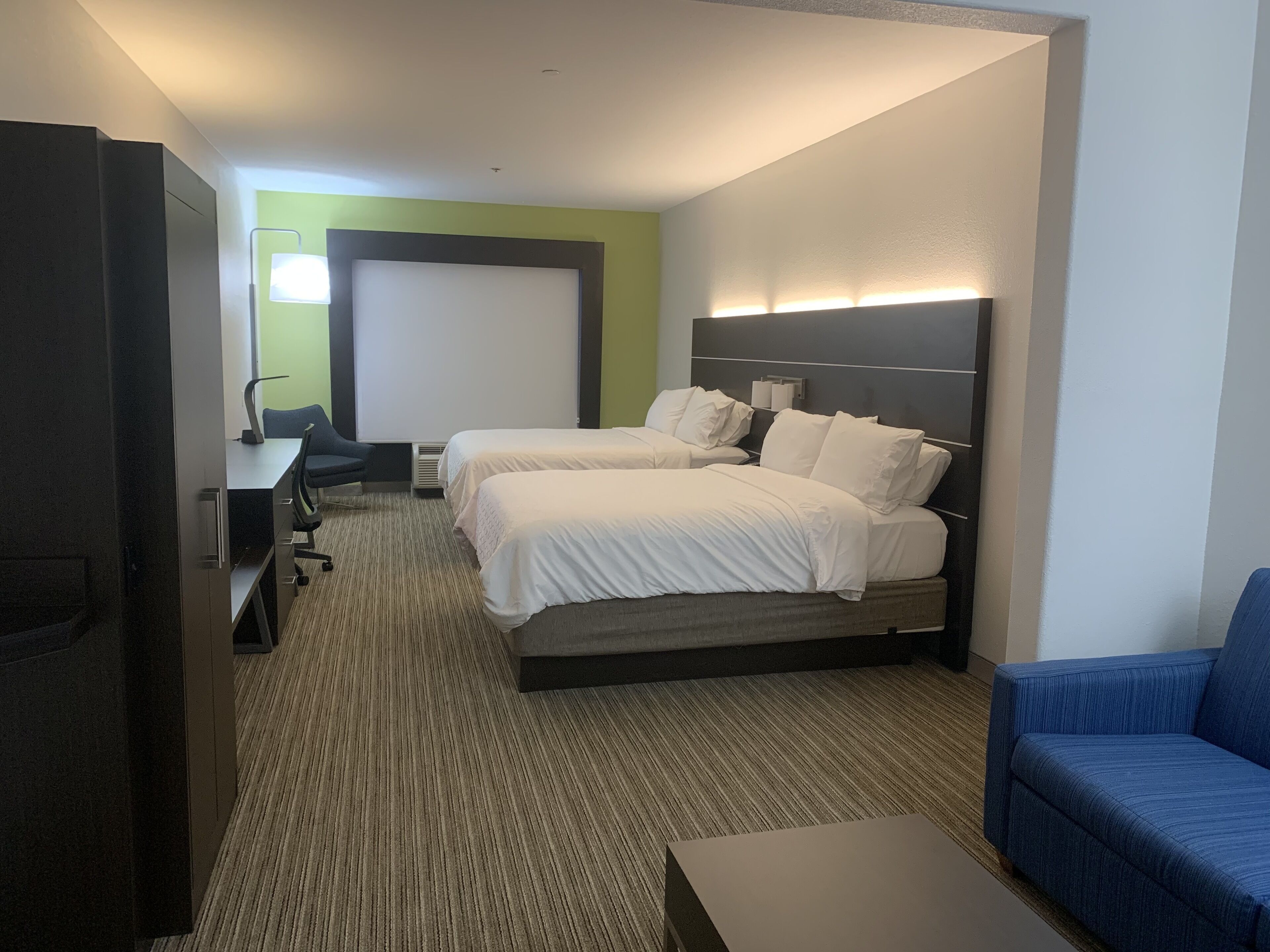 suite, multiple beds (add living area) | living area | 32-inch flat-screen tv with satellite channels, tv