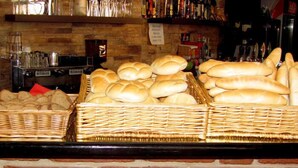 A bakery display with various types of bread and pastries. - Pension Prague City (Prague)