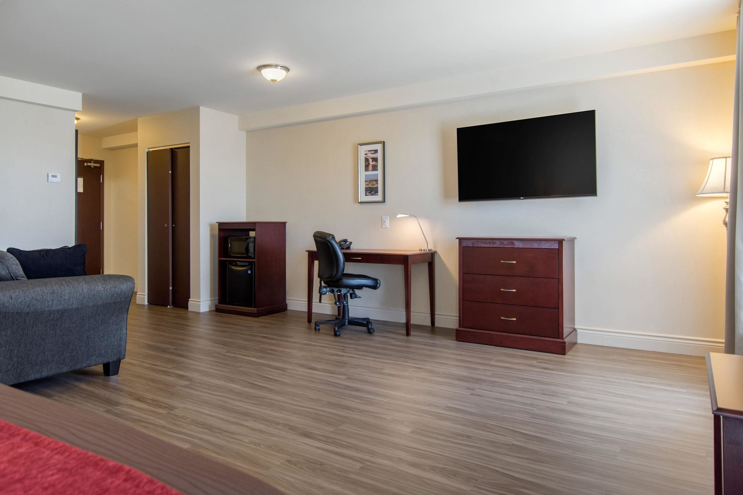 suite, 1 king bed, non smoking | select comfort beds, desk, laptop workspace, blackout curtains