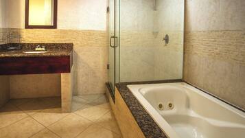 Superior Suite, Partial Ocean View | Bathroom | Shower, towels, soap, shampoo
