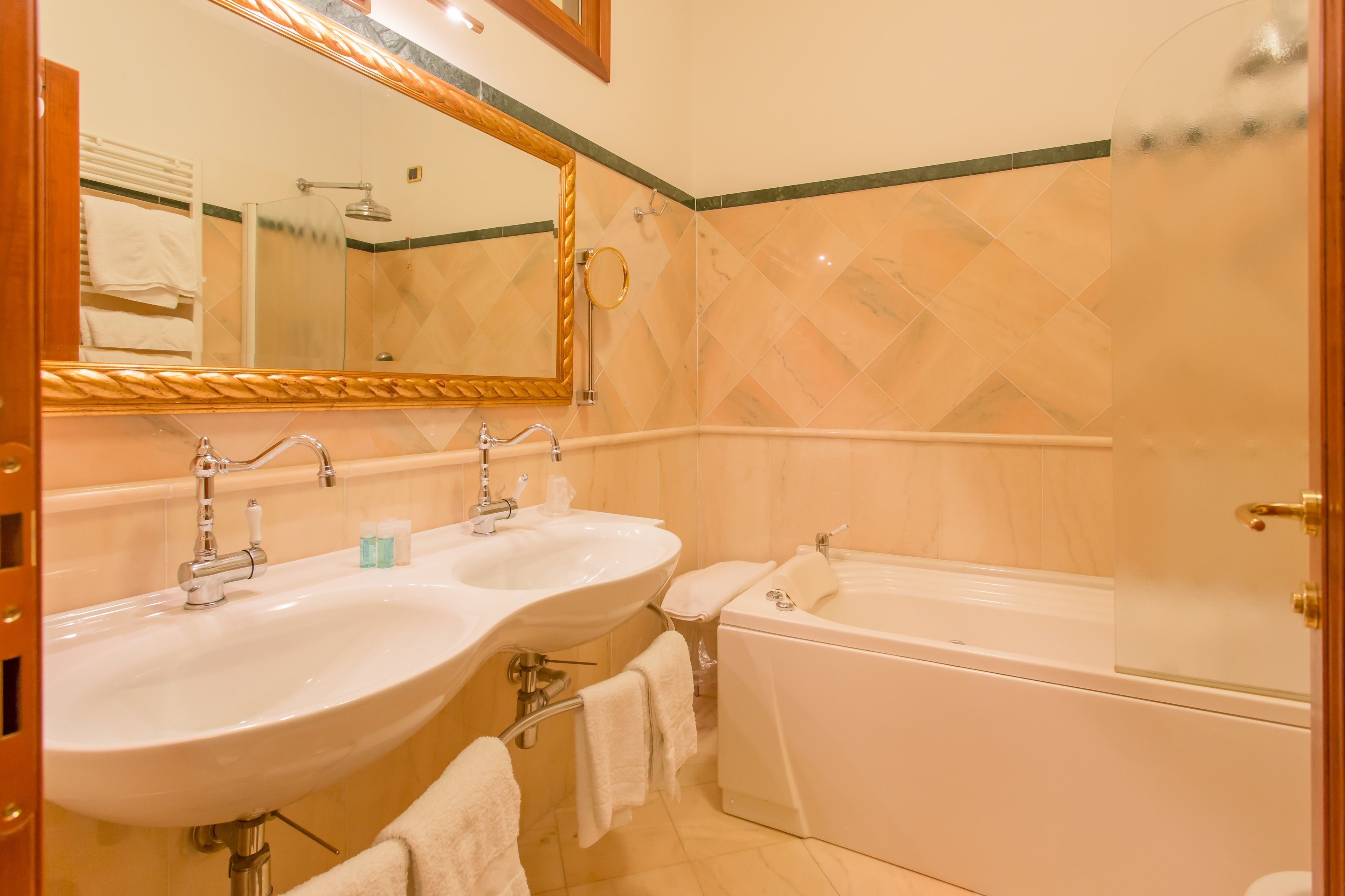 free toiletries, hair dryer, bidet, towels