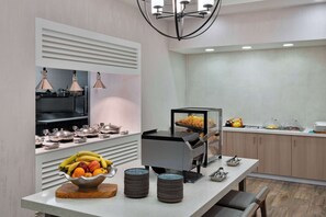 Daily buffet breakfast (USD 18 per person)