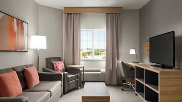 Suite, 1 Queen Bed with Sofa bed | Living area | 48-inch flat-screen TV with cable channels, TV
