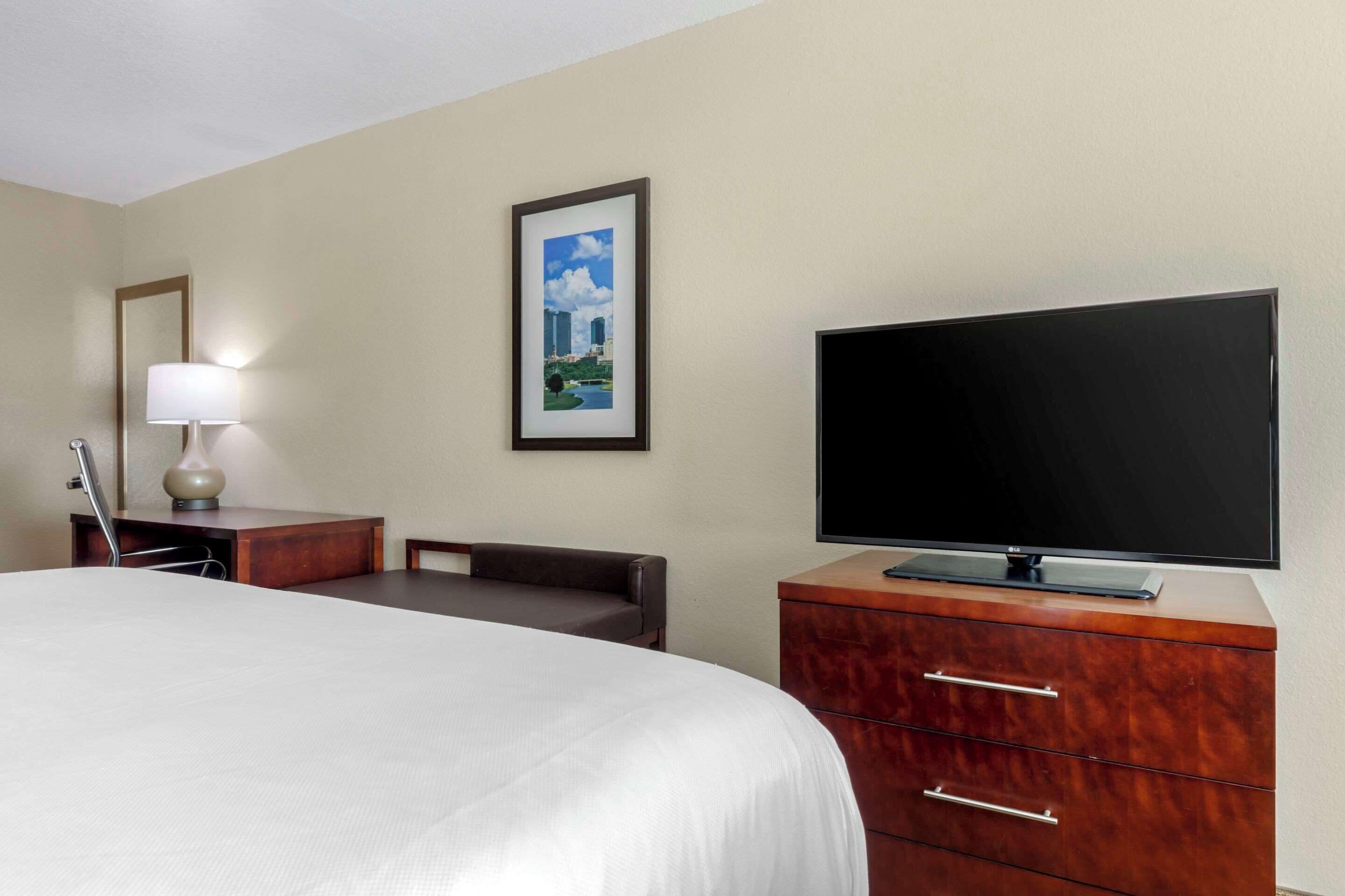 suite, 2 queen beds, non smoking | in-room safe, desk, laptop workspace, iron/ironing board