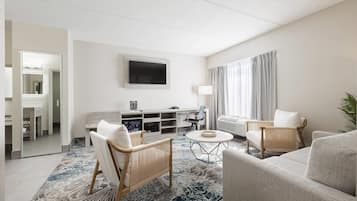 Suite, 1 kingsize bed, niet-roken (Upgrade) | Een bureau, een laptopwerkplek, een strijkplank/strijkijzer, gratis wifi