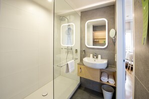 Eco-friendly toiletries, hair dryer, towels