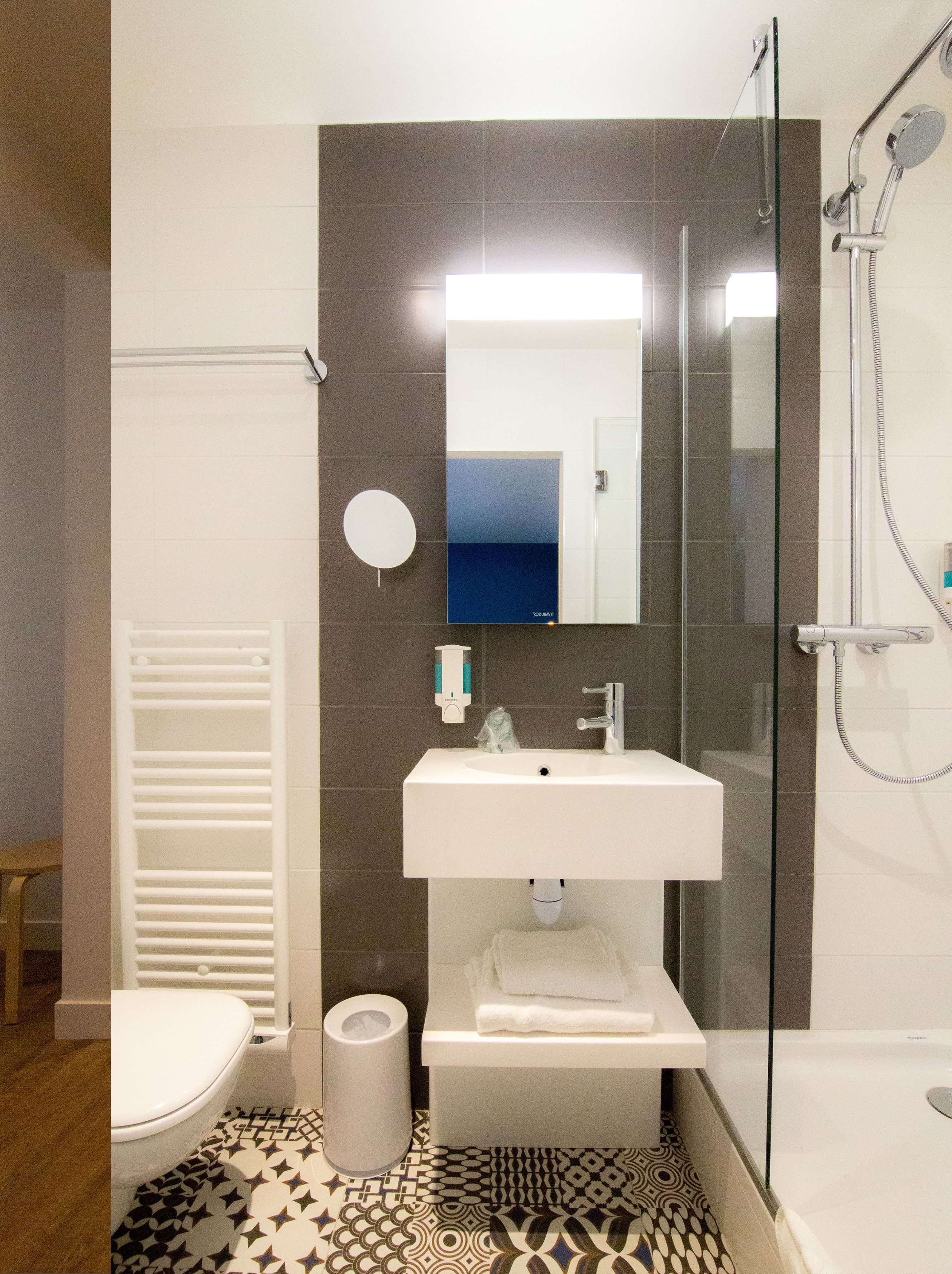 single room | bathroom | shower, rainfall showerhead, hair dryer, towels