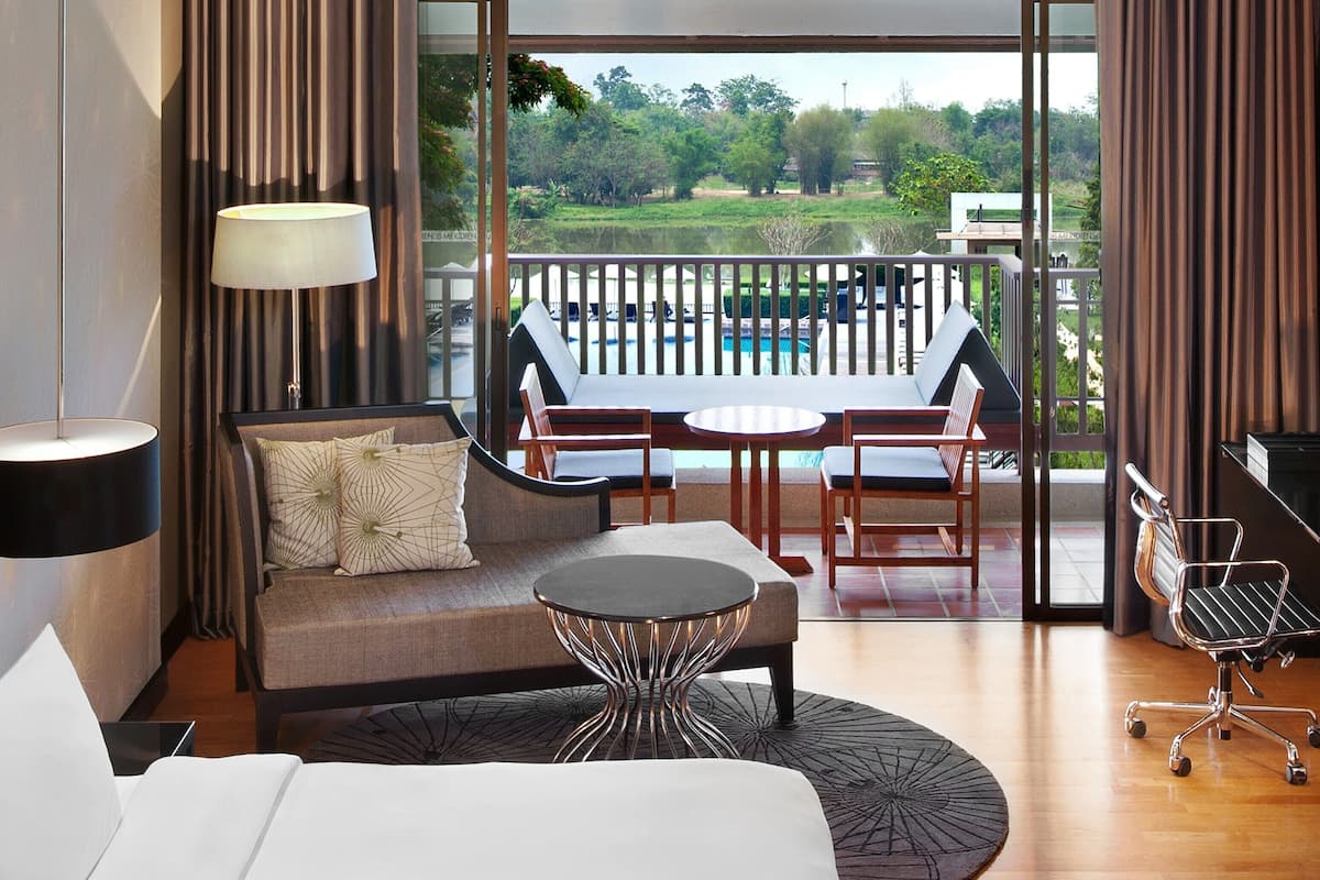 room, 1 king bed, non smoking, river view (balcony) | 1 bedroom, minibar, in-room safe, desk