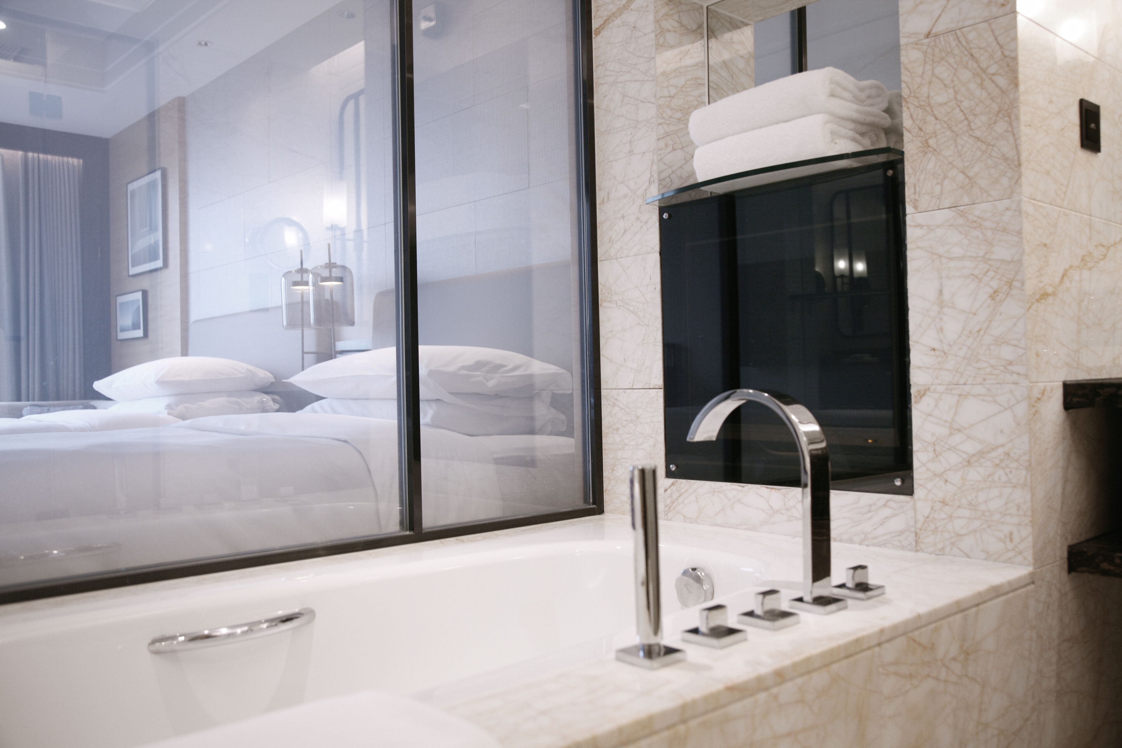 room, 2 double beds, smoking, city view | bathroom | designer toiletries, hair dryer, bathrobes, slippers