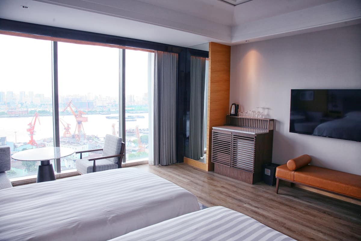Premium bedding, down comforters, Select Comfort beds, minibar