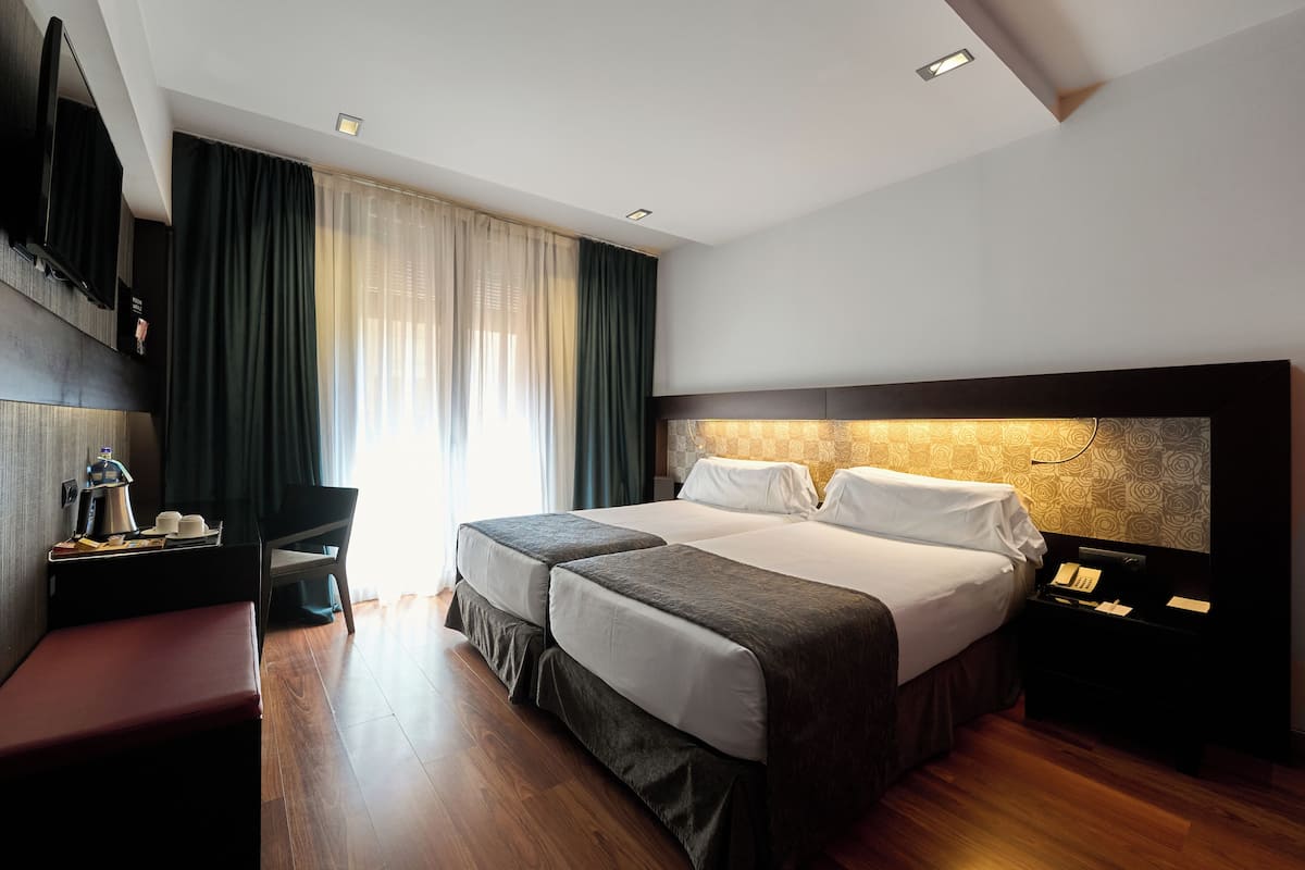 1 habitación, minibar y caja de seguridad en la habitación