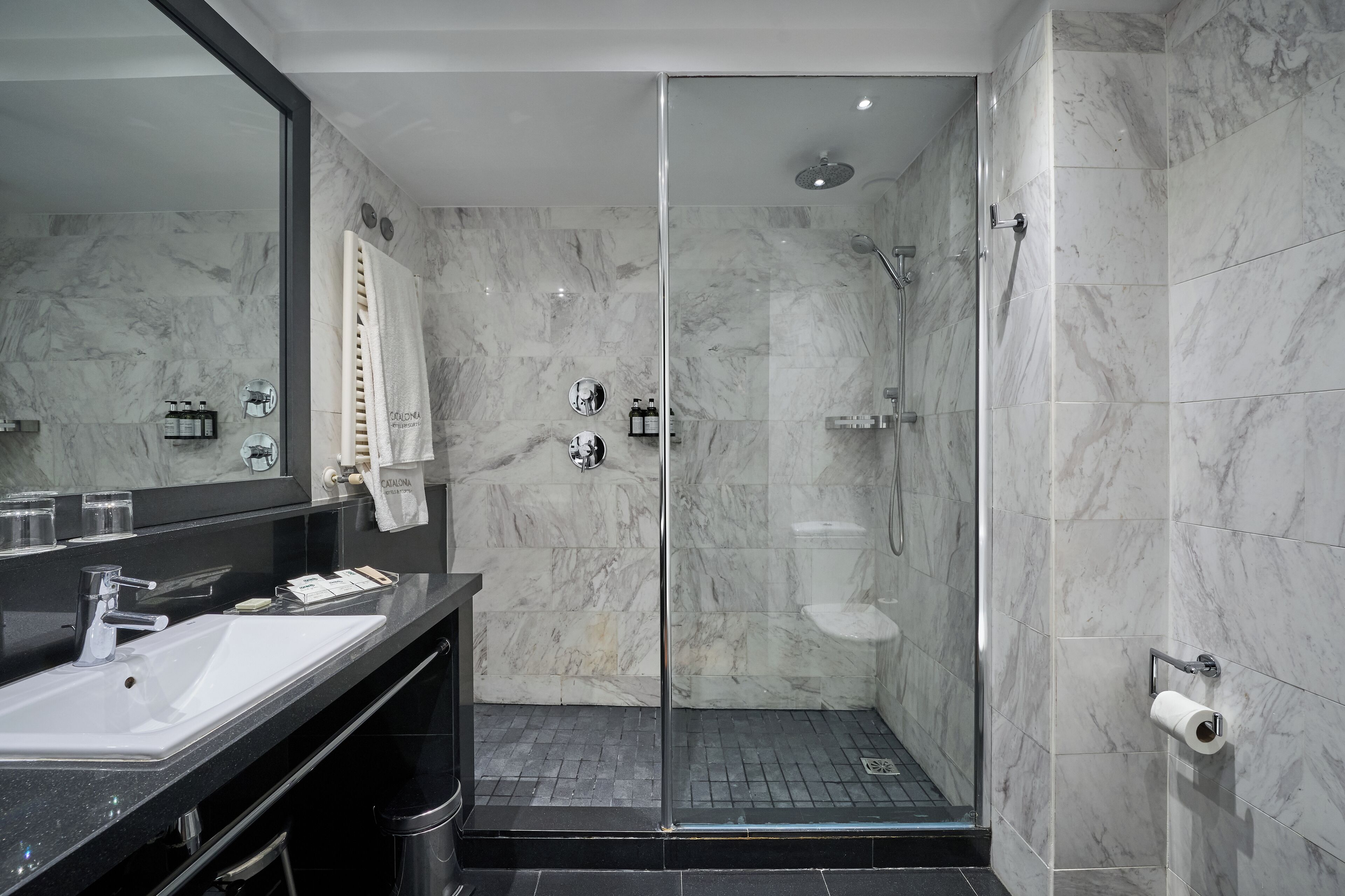 eco-friendly toiletries, hair dryer, towels, soap