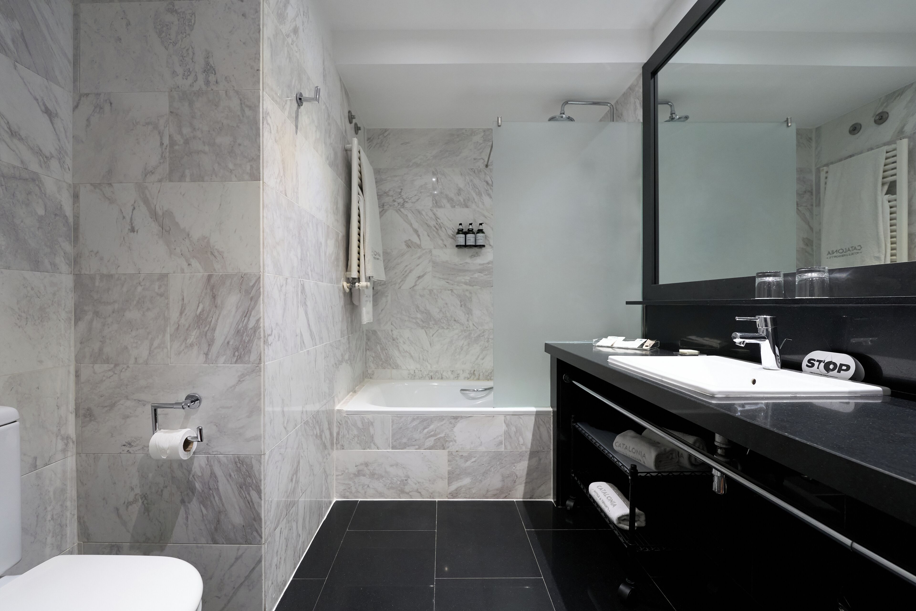 eco-friendly toiletries, hair dryer, towels, soap