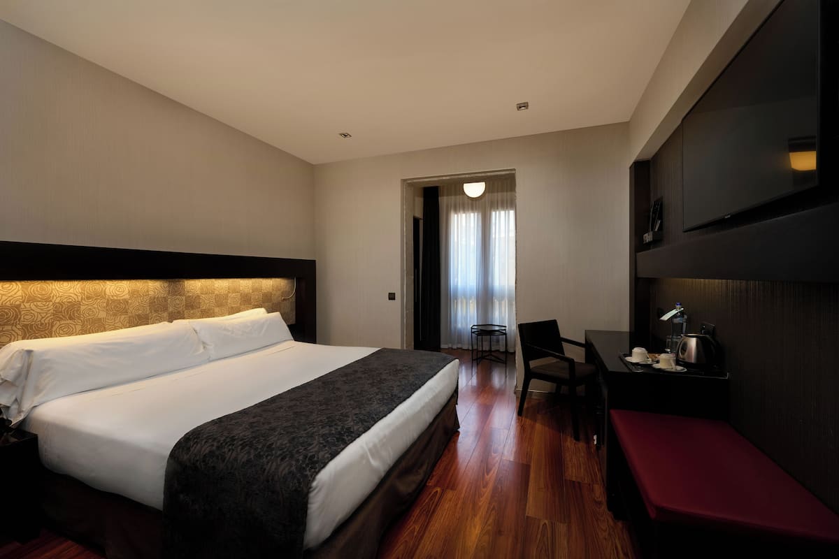 1 habitación, minibar y caja de seguridad en la habitación