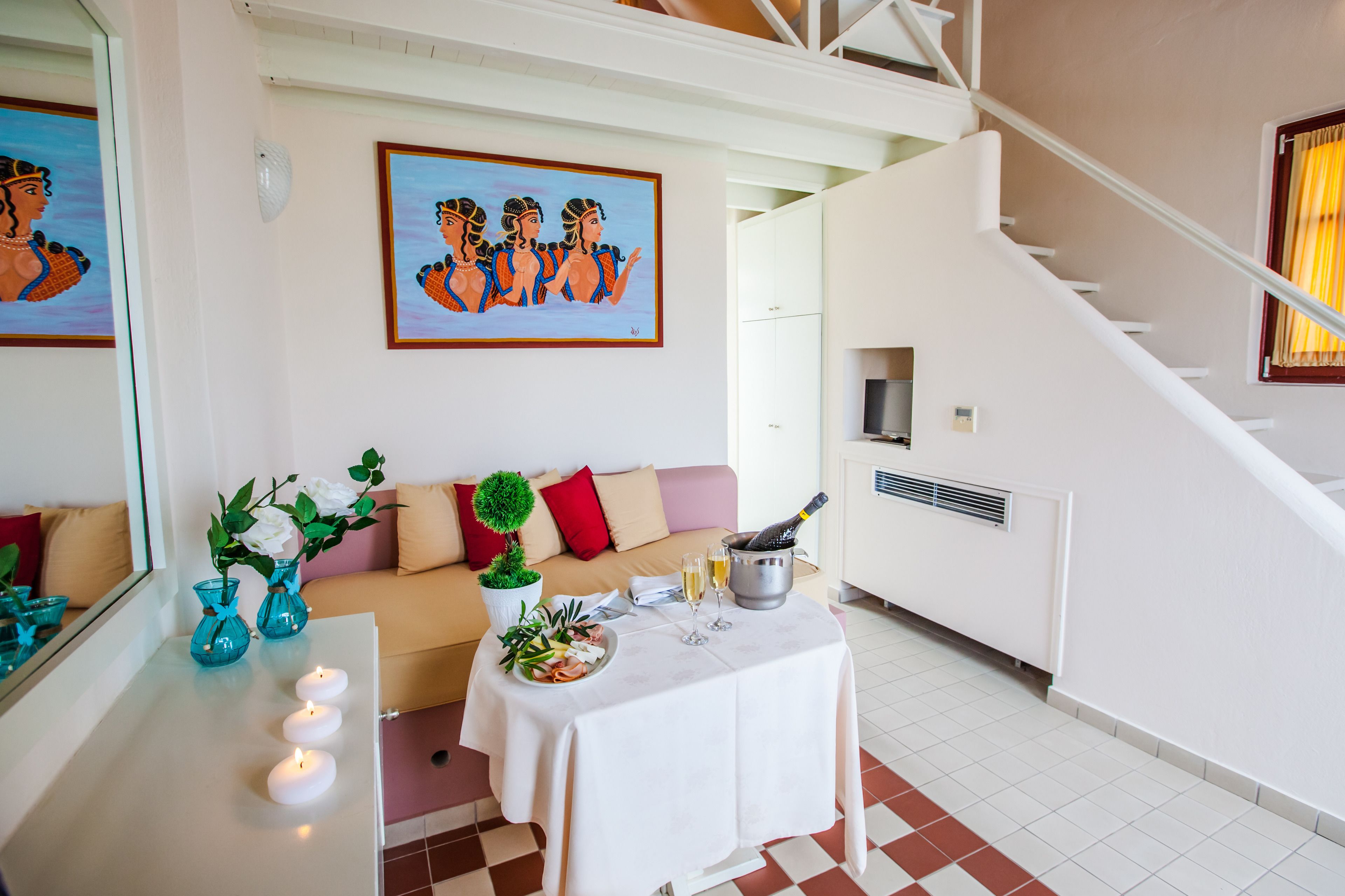 junior suite, sea view | living area | flat-screen tv