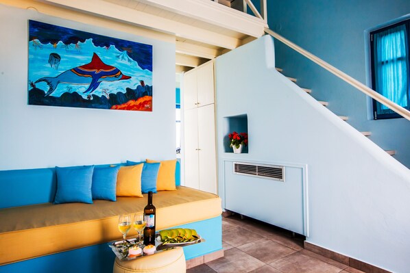 Junior Suite, Sea View | Living area | Flat-screen TV - Nautilus Dome (Santorini)
