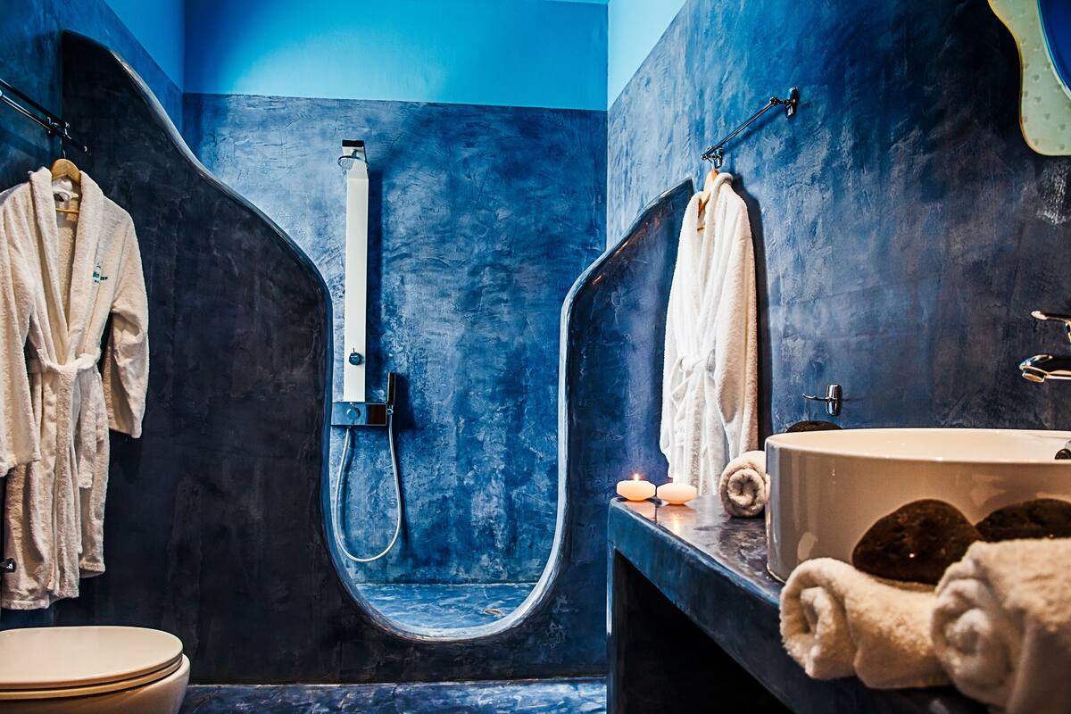 superior volcano view room | bathroom | shower, free toiletries, hair dryer, towels