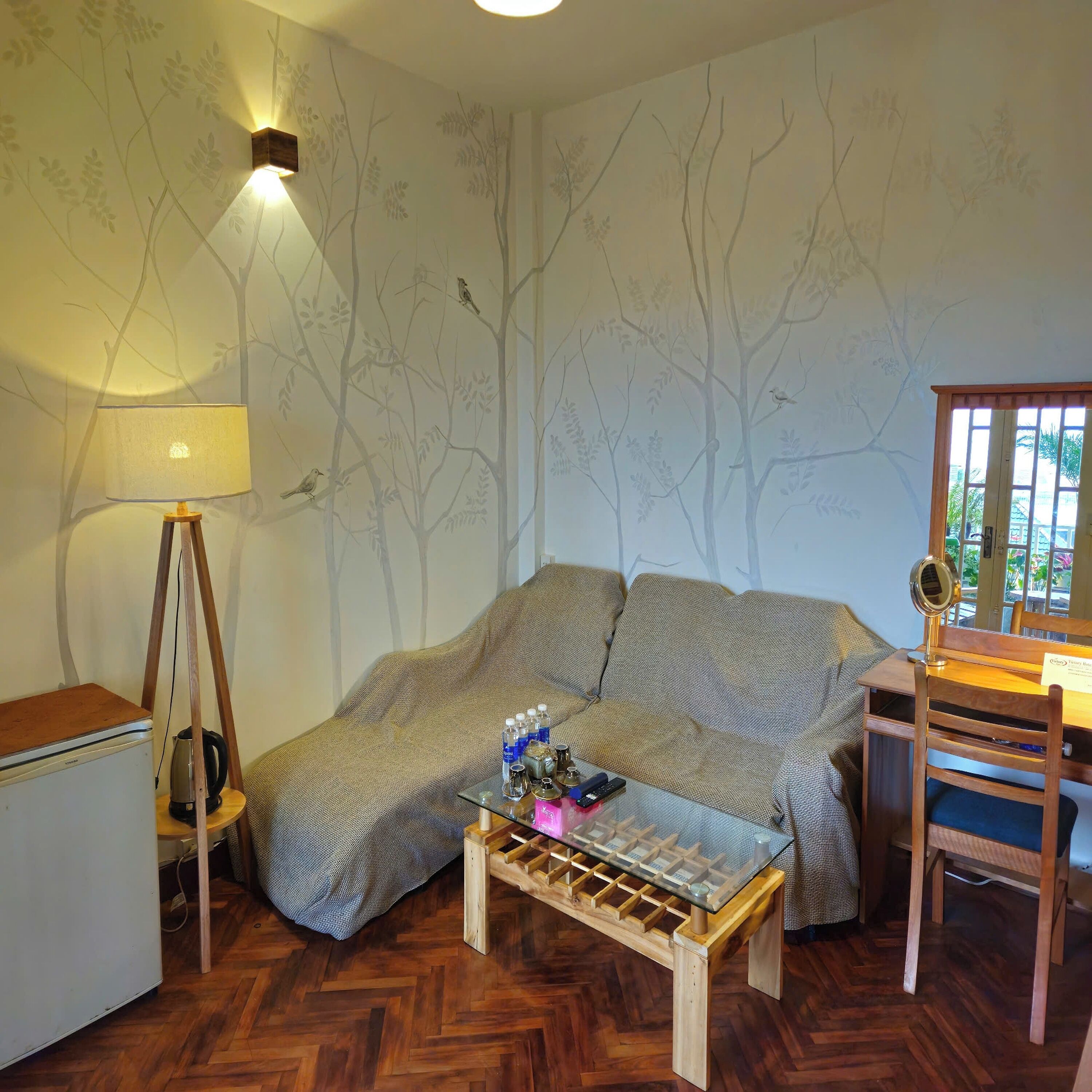 family room | premium bedding, minibar, in-room safe, desk