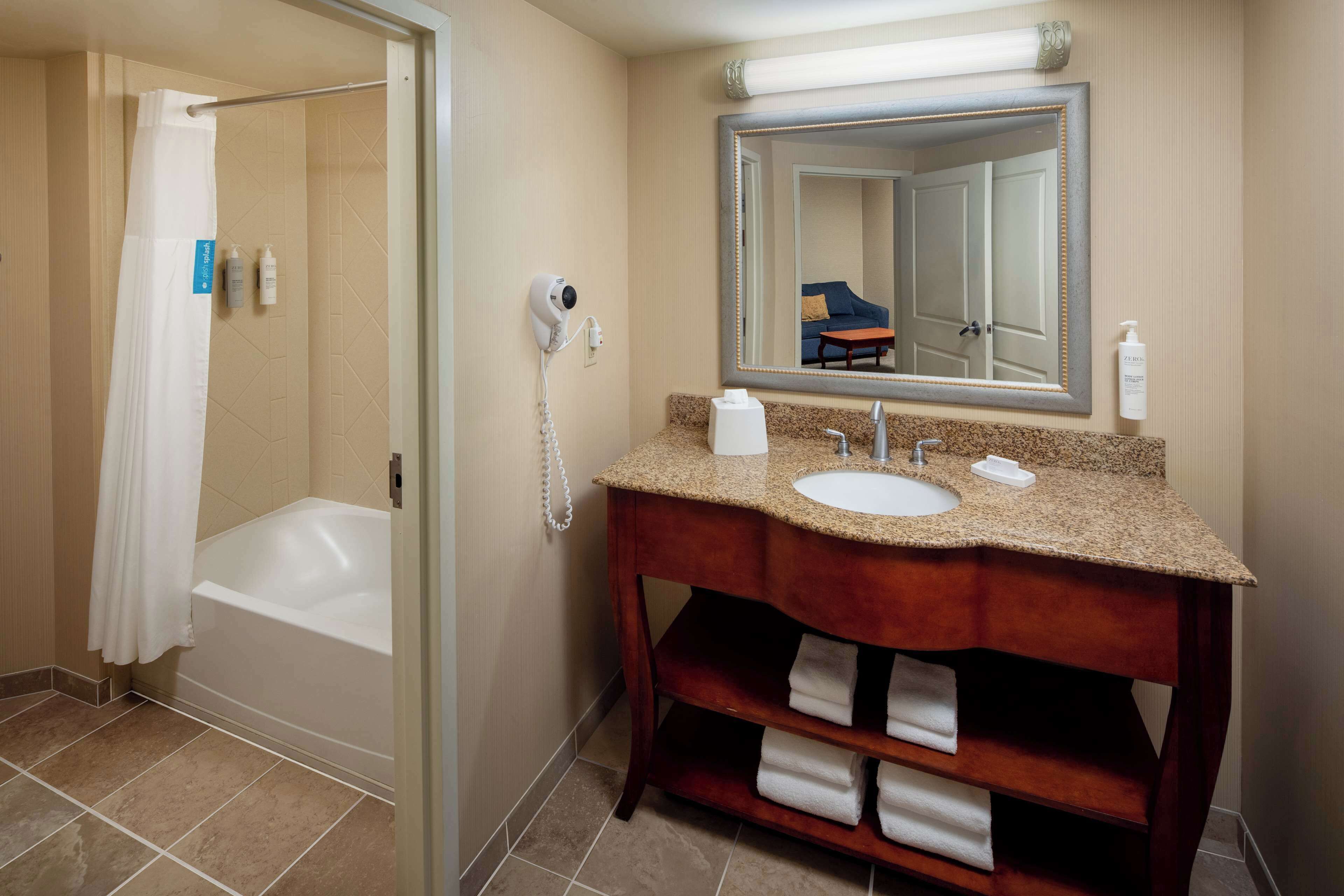 studio suite, 1 king bed, non smoking | bathroom | free toiletries, hair dryer, towels, soap