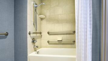 Combined shower/tub, designer toiletries, hair dryer, towels