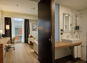 Rainfall showerhead, designer toiletries, hair dryer, slippers
