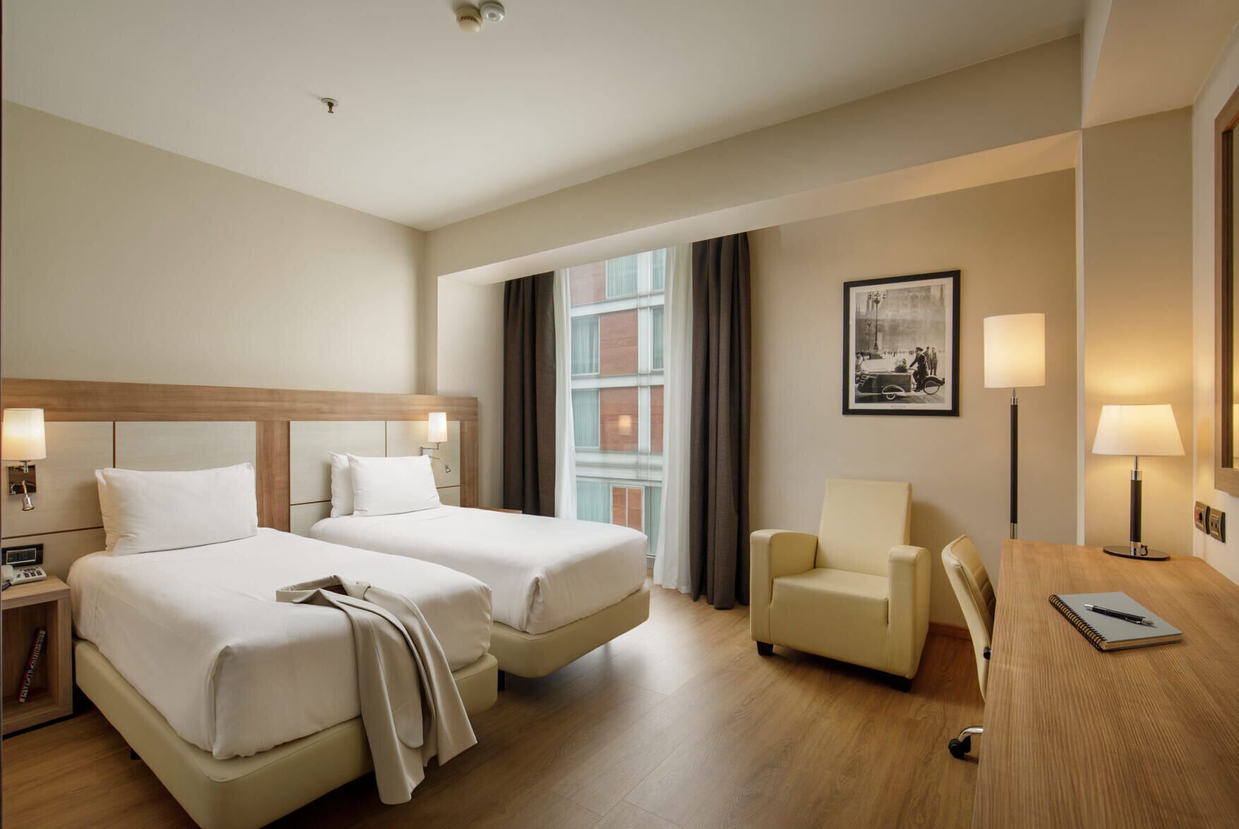 Premium bedding, down comforters, minibar, in-room safe