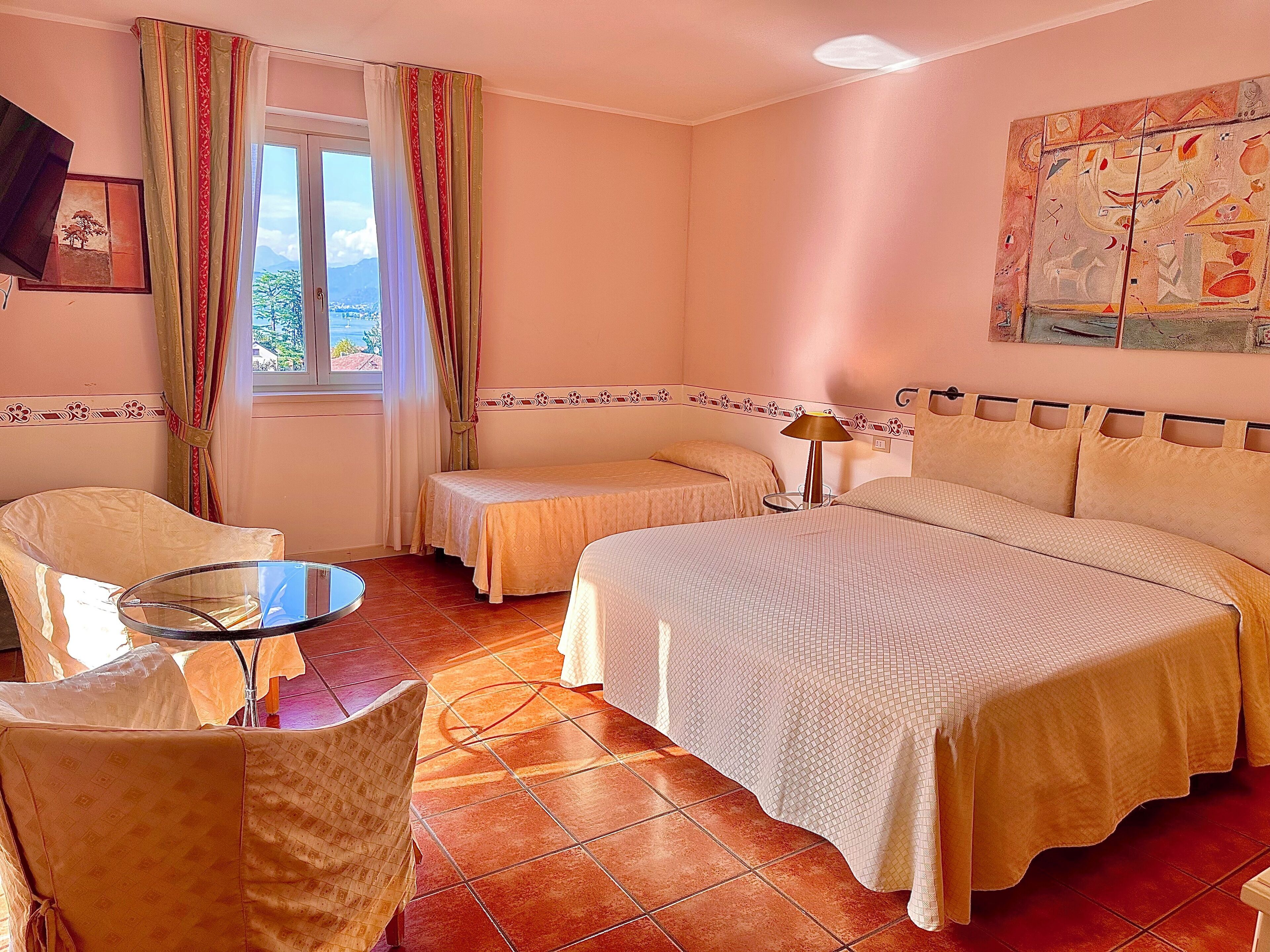 premium quadruple room | in-room safe, desk, blackout curtains, free wifi