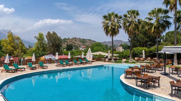 Seasonal outdoor pool, open 10 AM to 7 PM, free pool cabanas