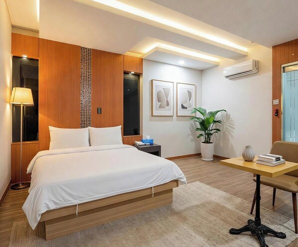 Habitación Premium doble | Ropa de cama de alta calidad y edredones de plumas