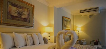 Tabla de planchar con plancha, wifi gratis y ropa de cama 