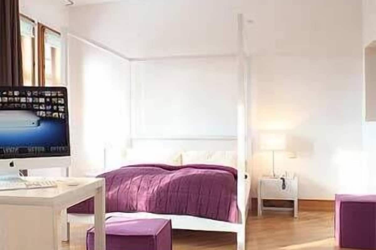 Junior suite | Een bureau, babybedden, extra bedden, gratis wifi